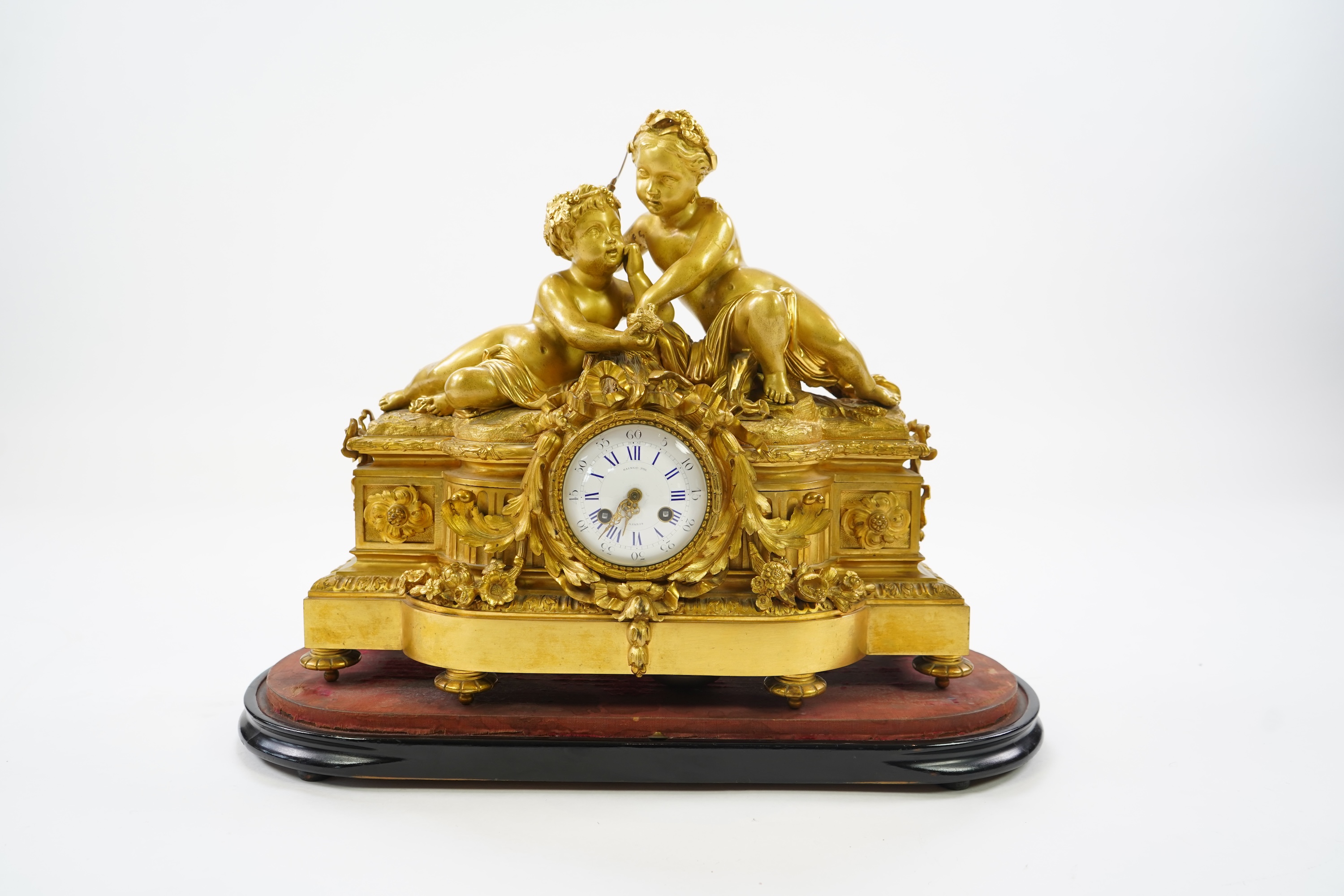 A late 19th century French gilt bronze figural mantel clock